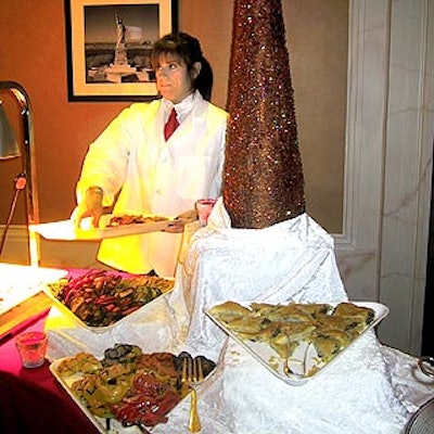The Catering Company served an abundance of food at buffets decorated with Christmas trees and stationed throughout Madame Tussaud's for Foot Locker's benefit for United Way of Greater New York City.