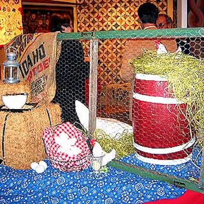 Buffet stations were decorated with items like haystacks and gingham-lined egg baskets to complement the folksy antiques being showcased.