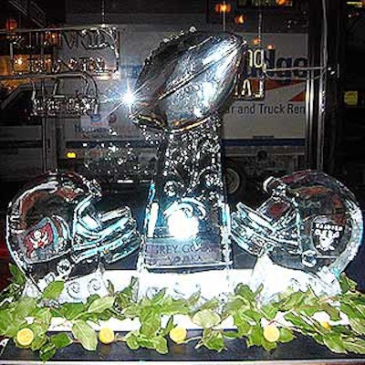 Ice Art made a 200-pound ice sculpture duplicate of the Super Bowl trophy.