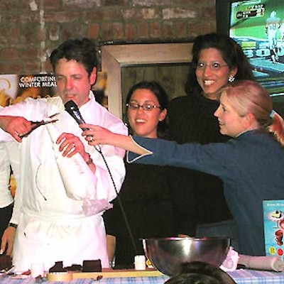 Pershing Square chef Wayne Harley Brachman and Food Network host Sara Moulton hosted a cooking demonstration during the game.