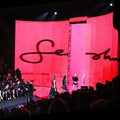 A giant curved screen displayed the Sean John logo at the end of the Sean John fall 2003 fashion show at Cipriani 42nd Street.