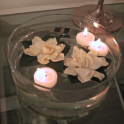 Flowers and floating votive candles by the store's in-house designer added an elegant touch to the Waterworks store opening.