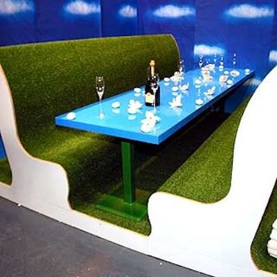David Rockwell opted for benches—covered in Astroturf creating the feeling of sitting on a mini golf course—to accompany his long retro-style booth. (Photo by Stillman Jefferson Thomas Digital Photography)