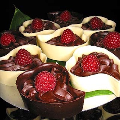 Heart-shaped chocolate cups with espresso mousse and shaved white chocolate were among the desserts at the V-Day NYC benefit at the Hammerstein Ballroom.