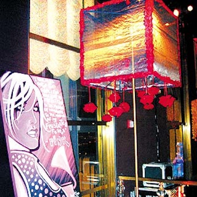 The decor also featured large lamps decorated with faux red flower petals and original paintings by artist Nick San Pedro.