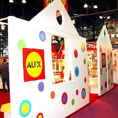 Alex welcomed attendees into a colorful playland enclosed by a bright polka-dot wall to show off its new merchandise.