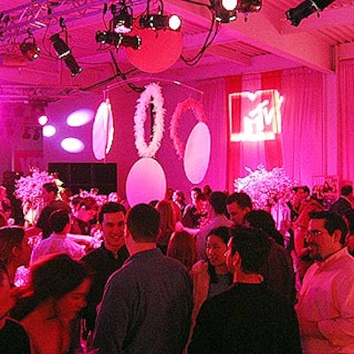 Big Wave International bathed the space in pink light, and Botanica hung some pink rings and discs over the main bar.