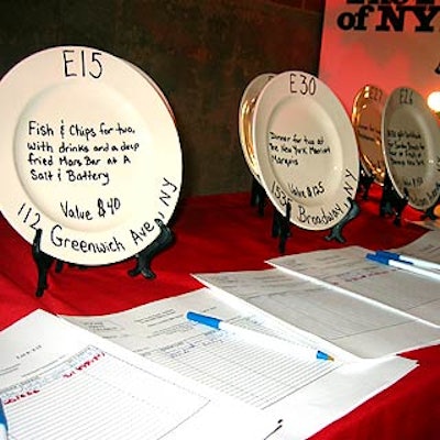 To show off the restaurant gift certificates in its silent auction, Bailey House decorated plates with details about each lot.