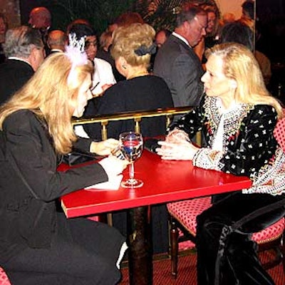 Pet psychic Cynthia Fellows (left) from Celestial Events 'communicated' with benefit guest Karen LeFrak's poodle.
