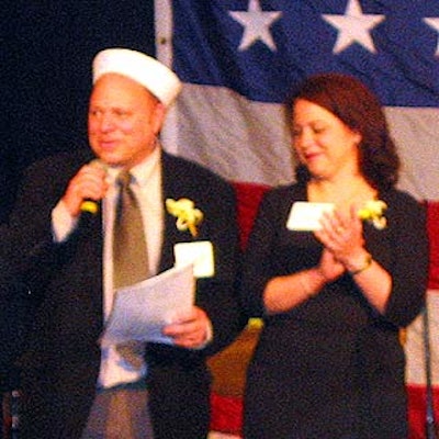 Event co-chairs Billy Amato of Bermuda Limousine and Rita Lopez of the Puerto Rico Convention Bureau made some pre-auction announcements.