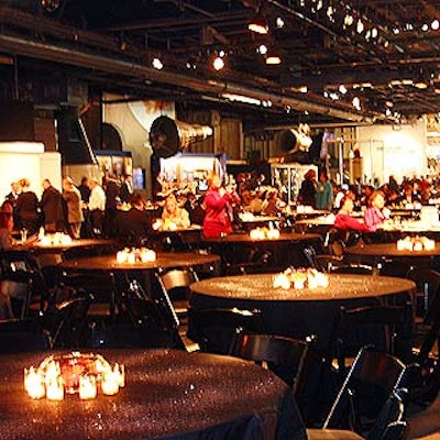 Tables were covered with black tablecloths and sprinkled with silver glitter.