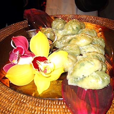 Fancy Girl Catering created all-organic hors d'oeuvres like vegetable dumplings with lotus plum sauce for the North Face store opening at the Ansonia building.