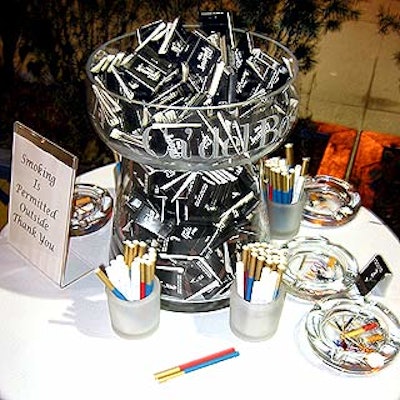 A few die-hard smokers took advantage of the free red, white and blue cigarettes that were placed outside with matches and ashtrays.