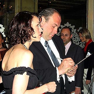 Honoree James Gandolfini bid on a silent auction item at the African Rainforest Conservancy's benefit auction at the newly opened Twenty Four Fifth.
