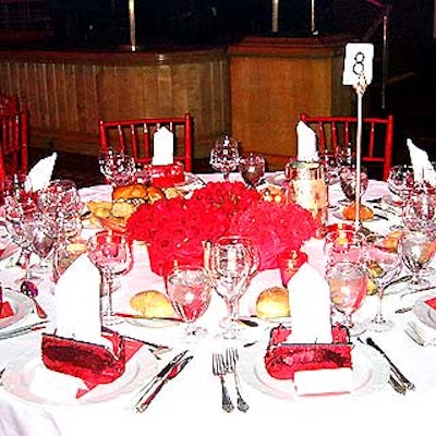 At the March of Dimes' Million Dollar Beauty Ball at the Waldorf=Astoria, red rose and carnation centerpieces decorated the dinner tables, and each dinner plate offered a red sequined evening bag with the dinner napkin and a red Tony & Tina lipstick tucked inside.