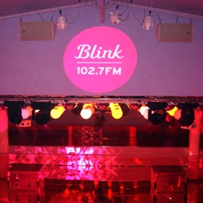 Pink projections with the radio station's new Blink logo decorated the venue.