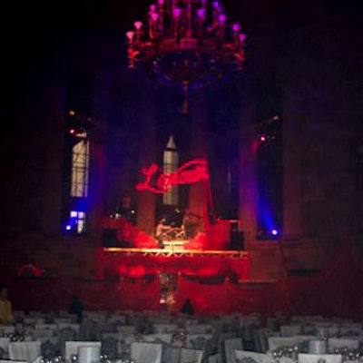 New York Academy of Art's Tribeca Ball at Gotham Hall paid homage to the opera La Boheme with decor inspired by its set, like the word 'L'Amour' spelled out in red lights.