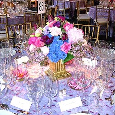Matthew David decorated dinner tables with spring centerpieces of peonies, hydrangea, anemones, roses and lisianthus.