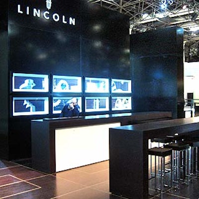 Lincoln created a sleek black and white environment to consult with future customers. The black floors were engraved with the Lincoln logo.