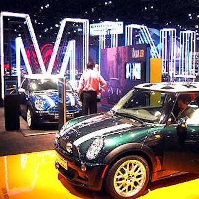 Mini showed off its cars with a giant, eye-catching sign and shiny white floor panels underneath the vehicles.
