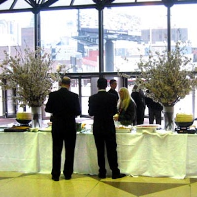 Bill Tansey decorated Taste's buffet tables with tall arrangements with flowering azalea, laurel and rhododendron.