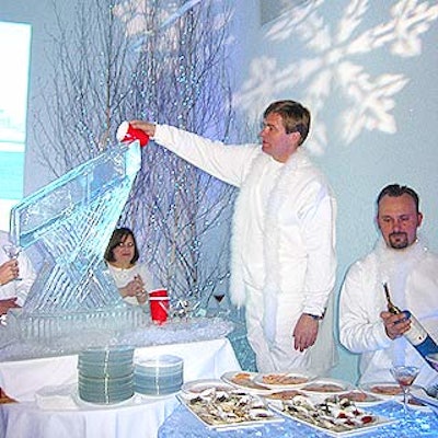 In the winter area, bartenders poured martinis down an ice slide.