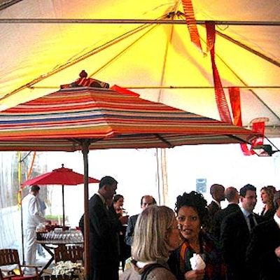 Outside on the patio deck, summer was celebrated underneath a clear enclosed tent and colorful umbrellas.
