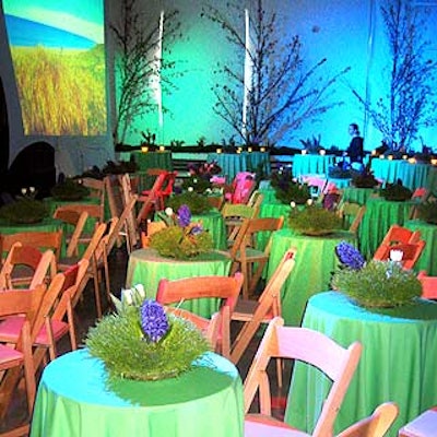 For the spring season, green tables had live flowers by Botanica, scented candles burning and wooden folding chairs.