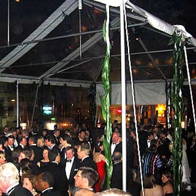 Clear tents covered the Russian Trade Ministry's back terraces, and green leaves were wrapped around the tent poles.