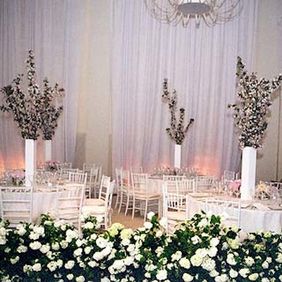 Isabel decorated the room with hedges of hydrangea and used crab apple blossoms and peonies on the tables.