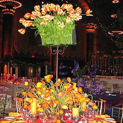 Meredith Waga Perez of Belle Fleur incorporated an antique music stand into her centerpiece, which featured a wild arrangement of fiery orange poppies and striped tulips.
