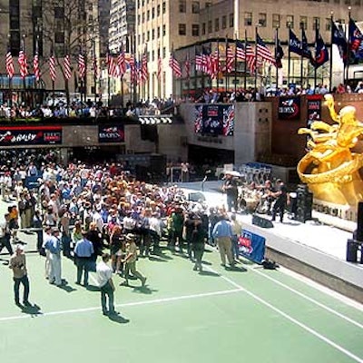 The band the Smithereens performed on the rink, which was turned into a tennis court with nets and signage.