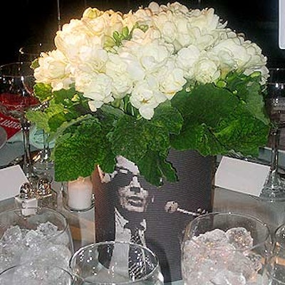 At the Kitchen's benefit at Gotham Hall, Matthew Robbins of Artfool wrapped black and white stills of past Kitchen performances around the vases of the white floral centerpieces.
