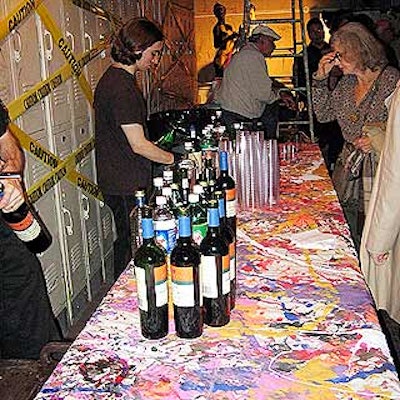 Paint-splattered canvases served as tablecloths.