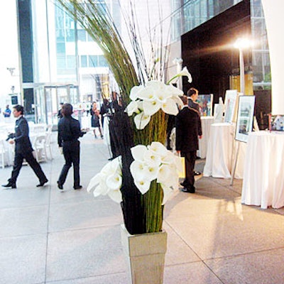 A tall arrangement of dogwood branches and bunches of calla lilies stood at the entrance to the Atrium at 590 Madison Avenue.