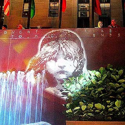 For Les Miserables' closing party at the Rink Bar at Rockefeller Center, See Factor Industries projected a large image of the character Cosette next to the rink's waterfall and Prometheus statue.