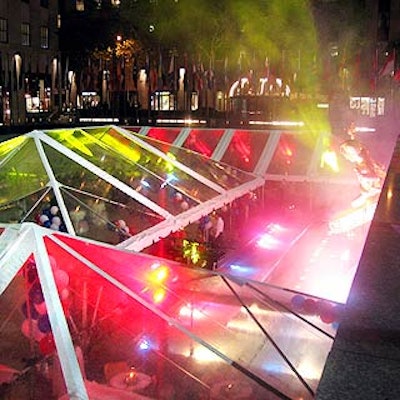 The tented rink was illuminated with bright, roving lights by See Factor Industries.