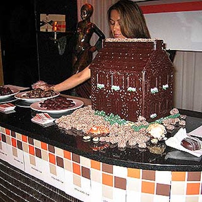 A tasting table offered buttercrunch bites, chocolate truffles and other treats from the store.