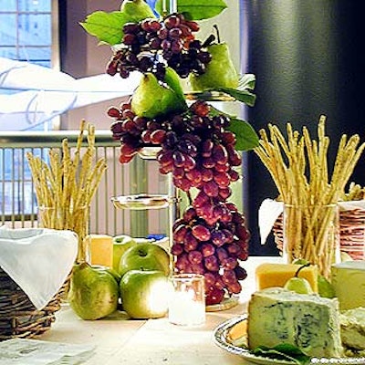 Fresh apples, pears and bunches of grapes decorated the cheese station.