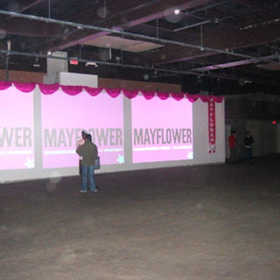 A series of oversized projection frames bearing the candidate's name lined one of the walls.