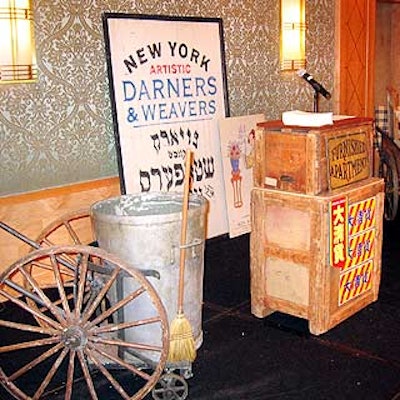 For the presentation area, props from Eclectic/Encore Props represented the business activity on the Lower East Side over a century ago with pushcarts, a sanitation cart and vintage signage.