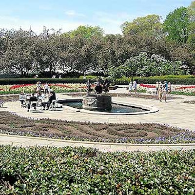 The Central Park Conservatory Garden features the 'Three Maidens Dancing' bronze statue and fountain.
