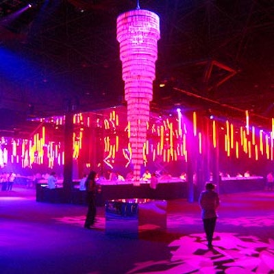 Adler also hung two giant chandeliers made with 10,000 plastic glowsticks, and glowing blue, magenta and violet lighting created a black light type of effect.