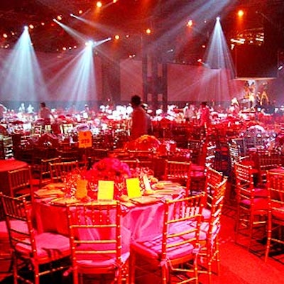 In the dining room, Adler surrounded all-red tables with enormous projection screens.