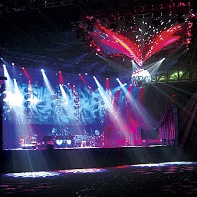 For the after-dinner concert from Elton John and James Brown, Atomic Design, NYX Design and Event Resources collaborated on a special set with mirror balls, draping and dynamic, colorful lighting.