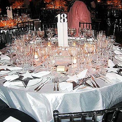 Tansey covered tables in silver lamé tablecloths, and Matthew Sporzynski of Couturier de Cardboard created silver star-shaped menus for each setting.