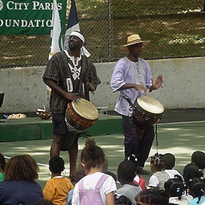 Members of the Kobla Dente Ensemble performed African drum songs for children as part of the Arts in the Park series.