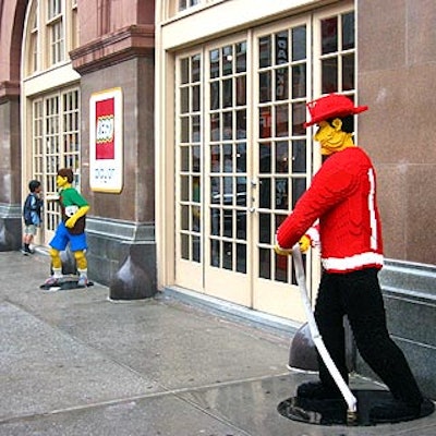 Life-sized Lego figures decorated the outside of the Altman Building for a launch party for Lego's new line.