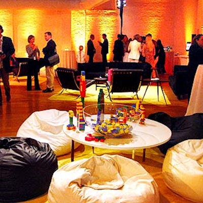 Furniture included beanbag seats and black leather lounge chairs and sofas. Bowls of Legos were available for guests to play with during the event.