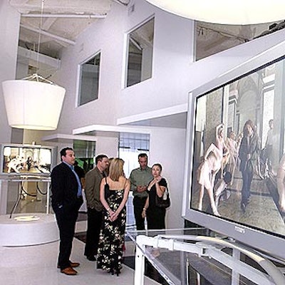 More screens were displayed atop clear tables.